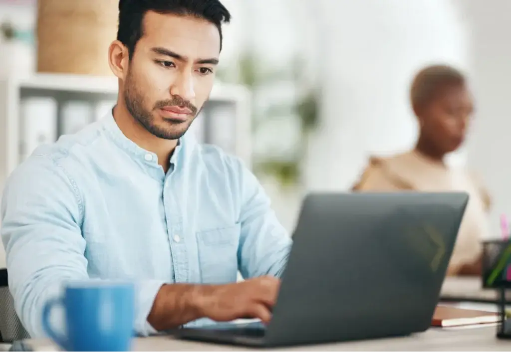 asian man laptop and typing in startup office