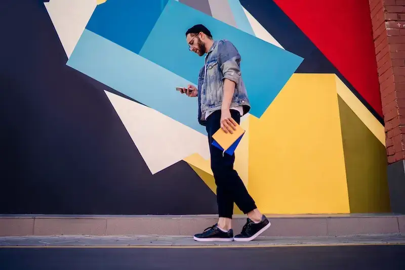 What is SEM man using phone while walking