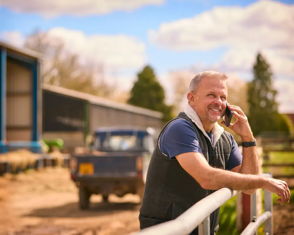 mature male farm worker standing outside barn maki 2024 05 29 22 33 56 utc